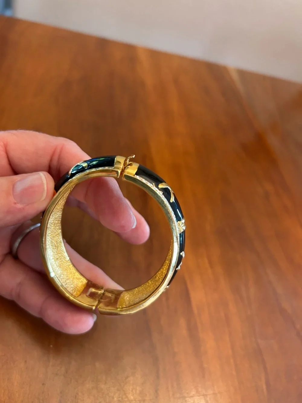 Gold-Tone Black Enamel X Accent Bangle Bracelet